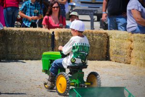 Child on Mini Tractor